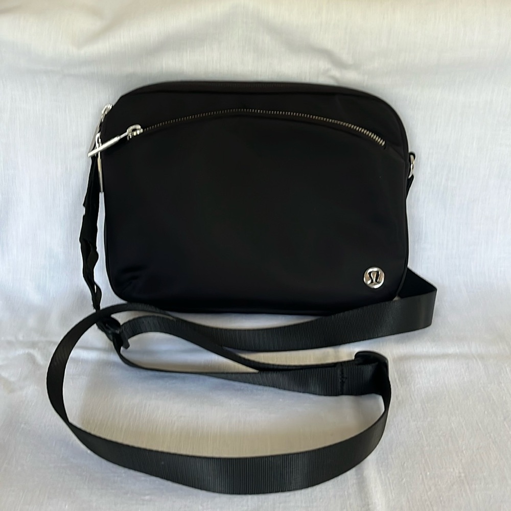 Lululemon water-repellent City Adventurer crossbody bag black with silver zipper